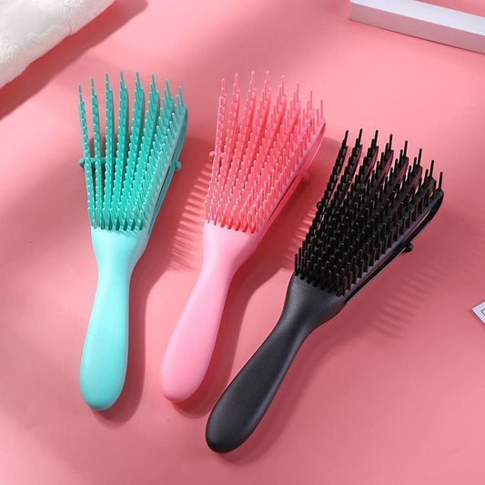 Cepillo cabello rizado.